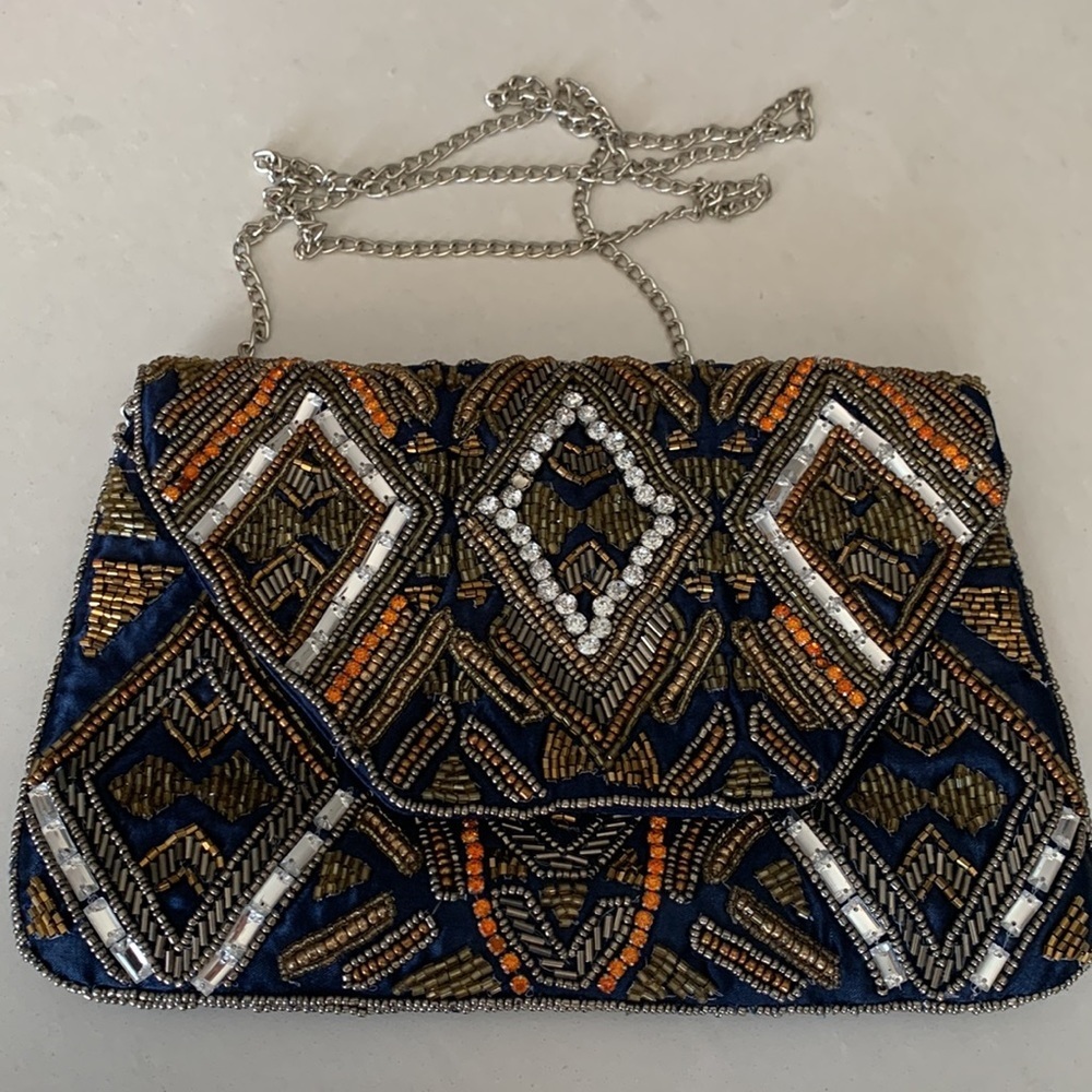 Stephanie Nicole beaded women's clutch/evening bag with silver chain.
